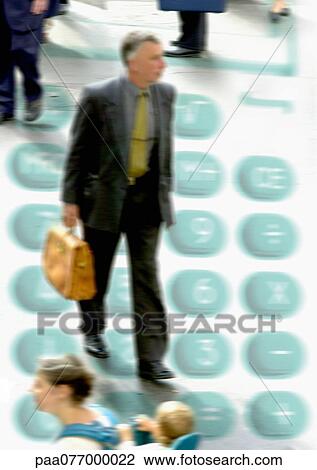 Stock Image - Businessman walking on calculator, montage. Fotosearch