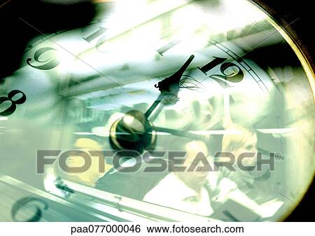 Clock superimposed on people riding subway train View Large Photo Image Stock Photograph - Clock superimposed on people riding subway train. Fotosearch
