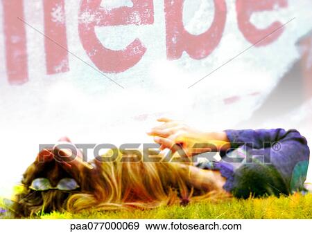 Couple lying on ground, and "love" text in German, montage View Large Photo Image Stock Photo - Couple lying on ground, and "love" text in German, montage. Fotosearch
