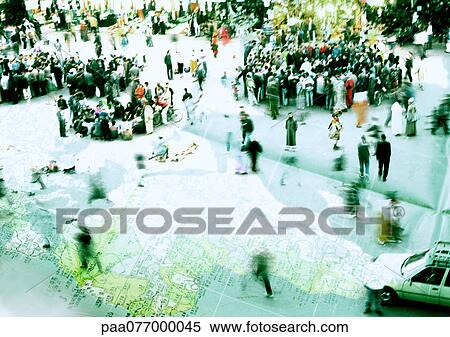 Stock Photography - Crowds of people standing on map of Africa, montage. Fotosearch