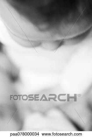 Baby, head down, high angle view, B&W. View Large Photo Image Picture - Baby, head down, high angle view, B&W.. Fotosearch
