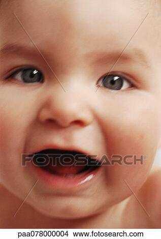 Baby with open mouth, close-up. View Large Photo Image Picture - Baby with open mouth, close-up.. Fotosearch