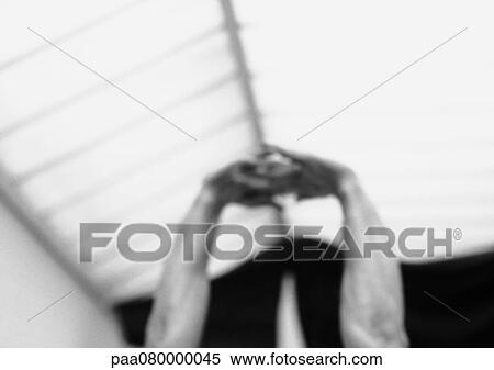 Man's arms stretched in air, blurred, black and white. View Large Photo Image Stock Photography - Man's arms stretched in air, blurred, black and white.. Fotosearch