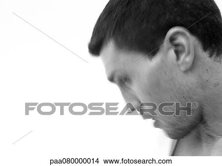 Picture - Man's face, side view, close-up, blurred, black and white.. Fotosearch