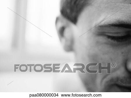 Picture - Part of man's face, blurry, close-up, black and white.. Fotosearch