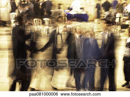 Stock Photograph - Israel, Jerusalem, group of people in square, blurred motion. Fotosearch