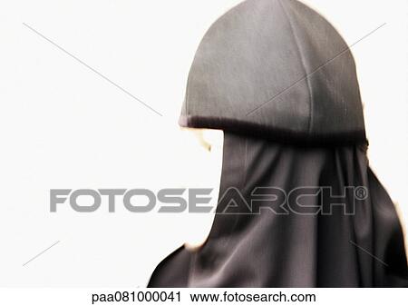 Stock Image - Israel, Jerusalem, Orthodox nun, close-up, blurred. Fotosearch