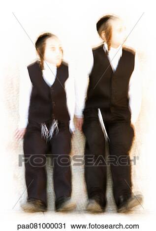 Stock Image - Israel, Jerusalem, two Jewish boys, blurred. Fotosearch