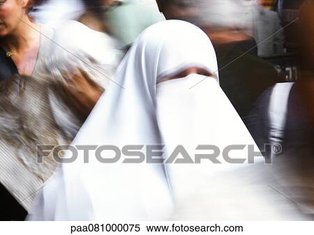 Stock Photography - Israel, Jerusalem, veiled woman in crowd. Fotosearch