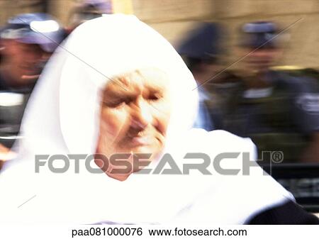 Israel, Jerusalem, woman wearing headscarf in crowd, close-up, blurred View Large Photo Image Stock Photograph - Israel, Jerusalem, woman wearing headscarf in crowd, close-up, blurred. Fotosearch