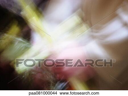 Person holding cross, blurry View Large Photo Image Picture - Person holding cross, blurry. Fotosearch
