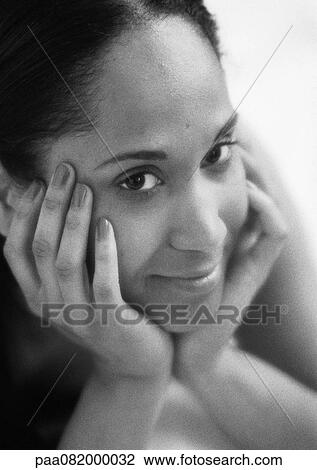 Woman holding face with hands, close-up, B&W. View Large Photo Image Stock Image - Woman holding face with hands, close-up, B&W.. Fotosearch