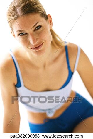 Woman in workout clothes, looking at camera. View Large Photo Image Stock Photo - Woman in workout clothes, looking at camera.. Fotosearch