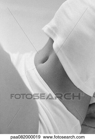 Woman's mid-section, side view, close-up, B&W. View Large Photo Image Stock Photo - Woman's mid-section, side view, close-up, B&W.. Fotosearch
