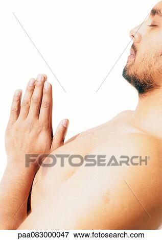 Barechested man praying, side view View Large Photo Image Stock Photo - Barechested man praying, side view. Fotosearch