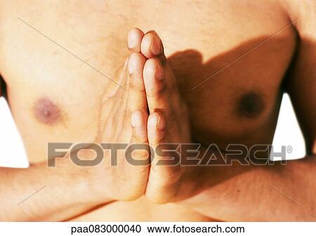Close up of barechested man's hands in prayer View Large Photo Image Stock Image - Close up of barechested man's hands in prayer. Fotosearch
