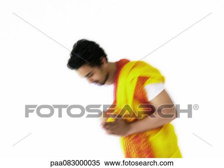 Hindu man bowing in prayer, blurry. View Large Photo Image Stock Photography - Hindu man bowing in prayer, blurry.. Fotosearch