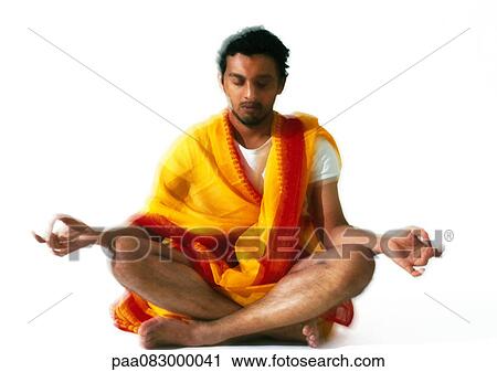 Hindu man meditating in lotus position, blurry. View Large Photo Image Stock Image - Hindu man meditating in lotus position, blurry.. Fotosearch