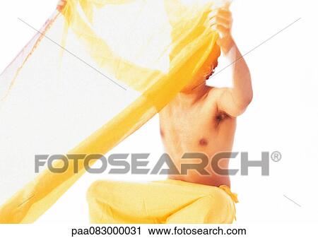 Hindu man sitting, holding up veil View Large Photo Image Stock Image - Hindu man sitting, holding up veil. Fotosearch