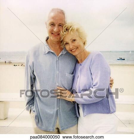 Mature couple embracing at the beach, portrait, soft focus View Large Photo Image Stock Image - Mature couple embracing at the beach, portrait, soft focus. Fotosearch