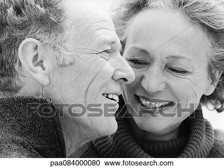 Mature woman looking at mature man smiling, portrait, B&W. View Large Photo Image Stock Image - Mature woman looking at mature man smiling, portrait, B&W.. Fotosearch