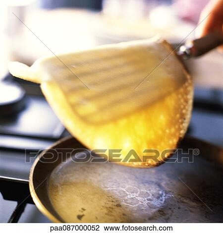 Close-up of crepe being flipped. View Large Photo Image Stock Image - Close-up of crepe being flipped.. Fotosearch