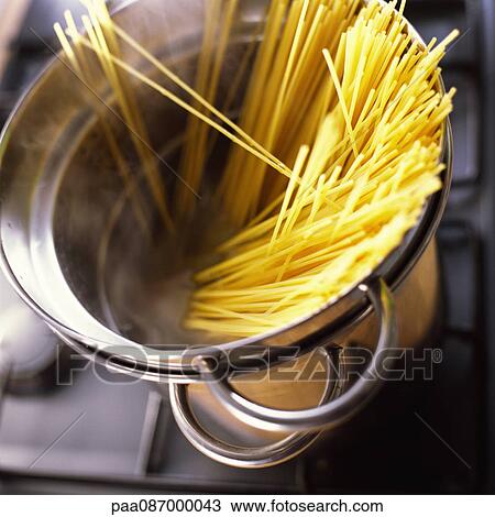 Stock Image - Close-up of pasta in pot.. Fotosearch