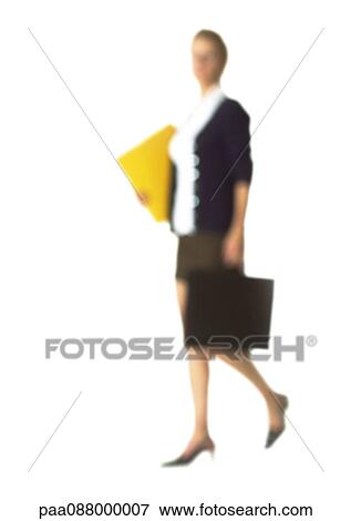 Silhouette of businesswoman carrying files and breifcase, on white background, defocused View Large Photo Image Stock Photo - Silhouette of businesswoman carrying files and breifcase, on white background, defocused. Fotosearch