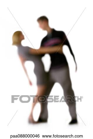 Silhouette of couple dancing, on white background, defocused View Large Photo Image Stock Photograph - Silhouette of couple dancing, on white background, defocused. Fotosearch