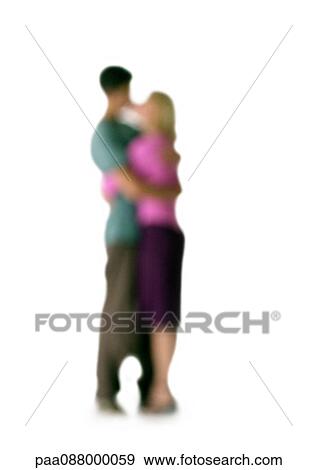 Silhouette of couple hugging and kissing, on white background, defocused View Large Photo Image Stock Photo - Silhouette of couple hugging and kissing, on white background, defocused. Fotosearch