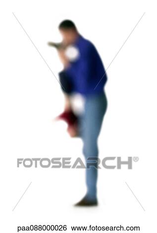 Stock Photograph - Silhouette of father holding child upside down, side view, on white background, defocused. Fotosearch