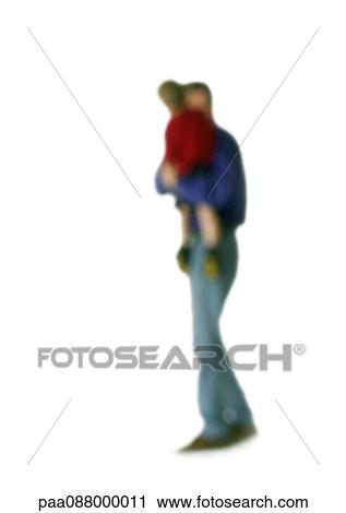 Stock Image - Silhouette of man holding child, on white background, defocused. Fotosearch