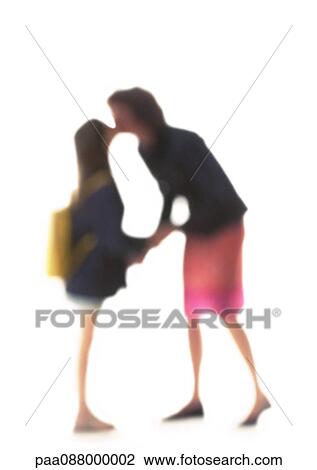 Silhouette of mother and daughter kissing on white background, defocused View Large Photo Image Stock Image - Silhouette of mother and daughter kissing on white background, defocused. Fotosearch