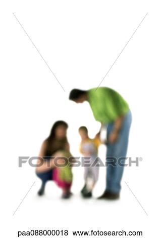 Stock Photo - Silhouette of parents speaking to two children, on white background, defocused. Fotosearch