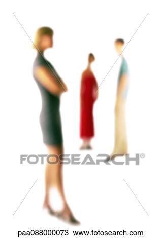 Stock Image - Silhouette of three people standing apart, on white background, defocused. Fotosearch