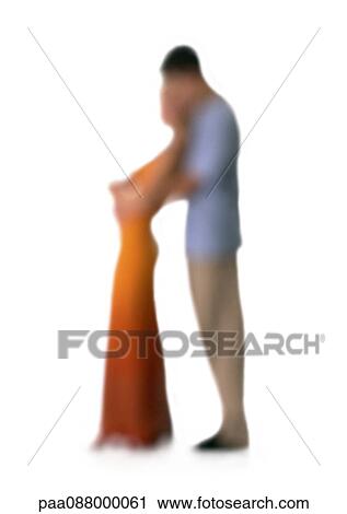 Stock Image - Silhouette of woman leaning back on man, on white background, defocused. Fotosearch