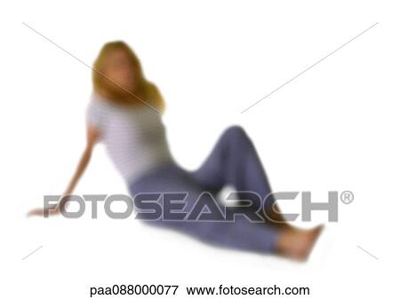 Silhouette of woman sitting on ground with legs out, on white background, defocused View Large Photo Image Stock Photo - Silhouette of woman sitting on ground with legs out, on white background, defocused. Fotosearch
