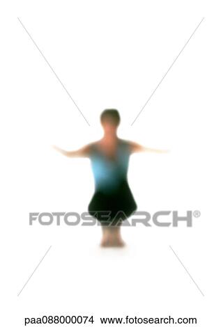 Picture - Silhouette of woman squatting down with arms out, on white background, defocused. Fotosearch