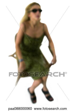 Silhouette of woman with sunglasses sitting in chair, on white background, defocused View Large Photo Image Stock Image - Silhouette of woman with sunglasses sitting in chair, on white background, defocused. Fotosearch
