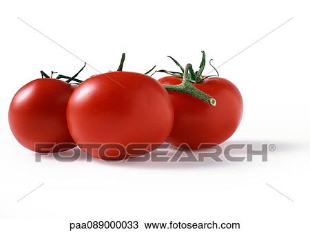Stock Image - Three vine tomatoes, side view, close-up. Fotosearch
