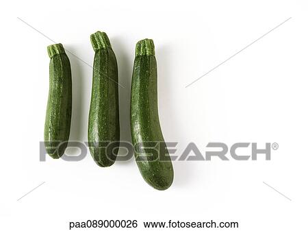 Three zucchini, full length View Large Photo Image Stock Photograph - Three zucchini, full length. Fotosearch