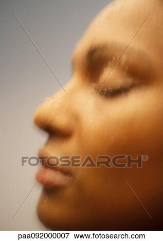 Woman's face, eyes closed, side view, blurred View Large Photo Image Stock Photo - Woman's face, eyes closed, side view, blurred. Fotosearch