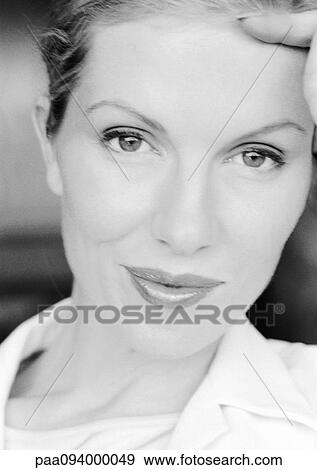 Stock Photo - Woman's face, portrait, close-up, B&W. Fotosearch