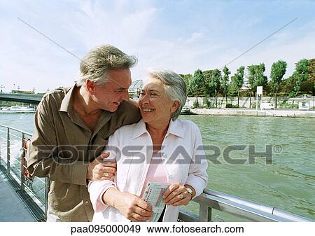 France, Paris, mature man and woman on a boat in the River Seine View Large Photo Image Stock Photo - France, Paris, mature man and woman on a boat in the River Seine. Fotosearch