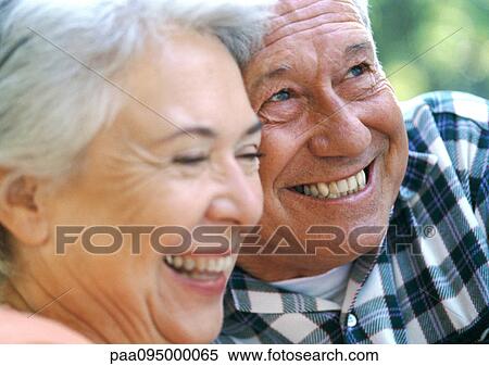 Mature man and woman smiling, close-up View Large Photo Image Stock Photography - Mature man and woman smiling, close-up. Fotosearch