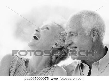 Mature man and woman smiling, woman with head back, close-up, B&W View Large Photo Image Stock Photography - Mature man and woman smiling, woman with head back, close-up, B&W. Fotosearch