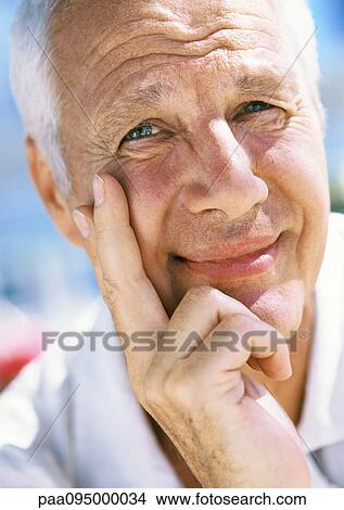 Picture - Mature man's face, looking at camera, close-up, portrait. Fotosearch