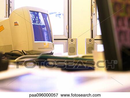 Computer monitor on desk View Large Photo Image Stock Photo - Computer monitor on desk. Fotosearch