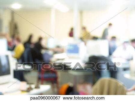 Stock Photo - People in office, blurred. Fotosearch
