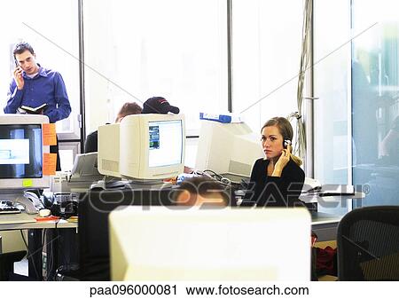 Stock Image - People working in office. Fotosearch